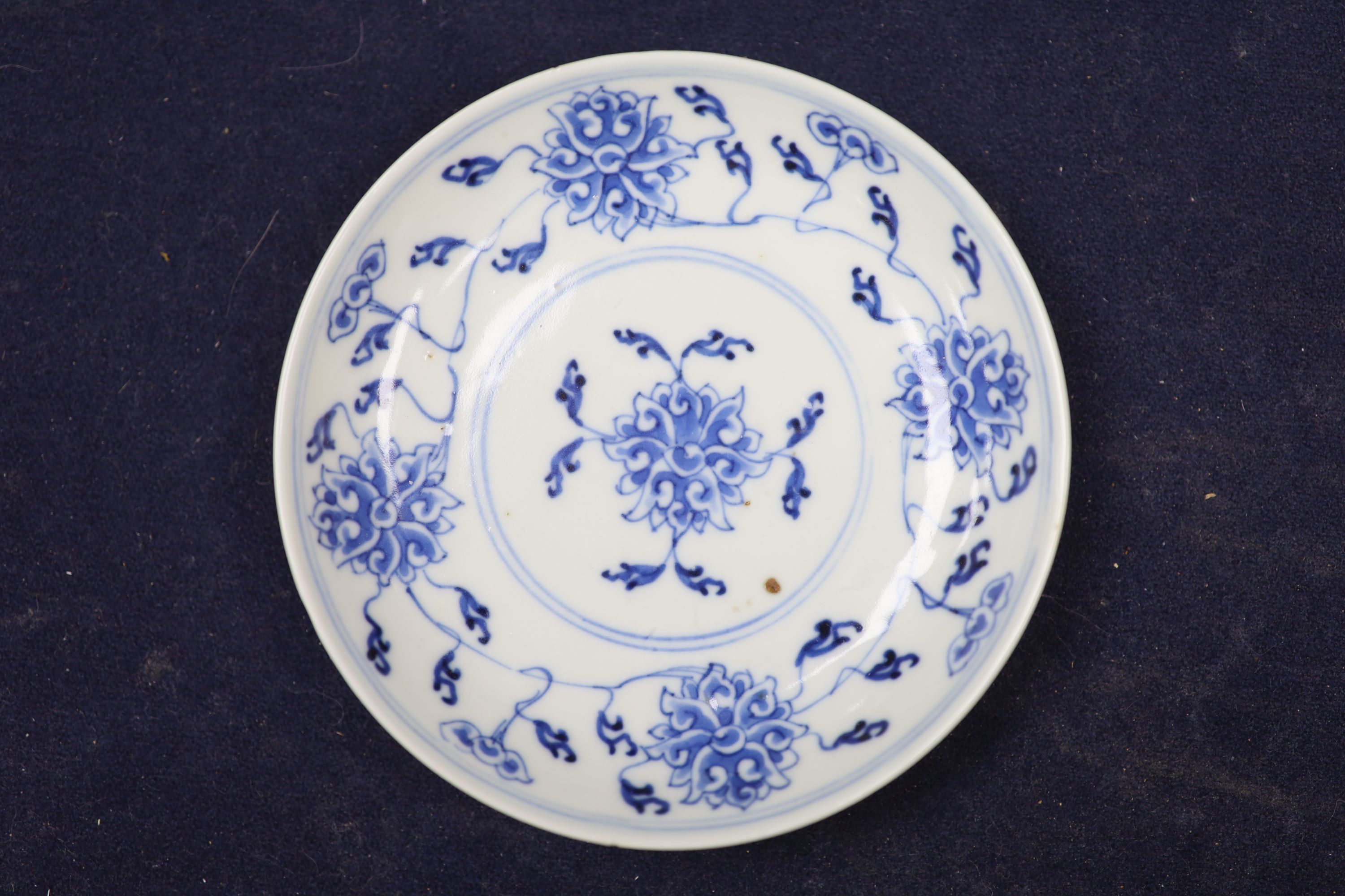 Two Chinese blue and white vases and a dish, together with a famille rose dish, tallest 28cm